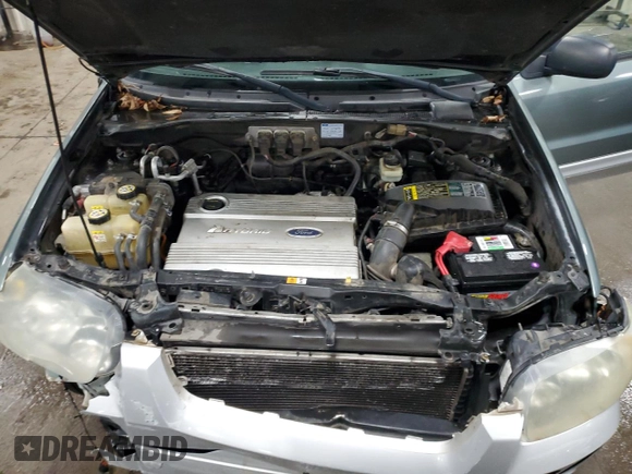 2005 Ford Escape Hybrid with VIN 1FMCU95H55KD77032, listed as a Copart auction lot 41877345 with 241,279 mi miles and Salvage title. Bid and sale history available at DreamBid. Image 12.