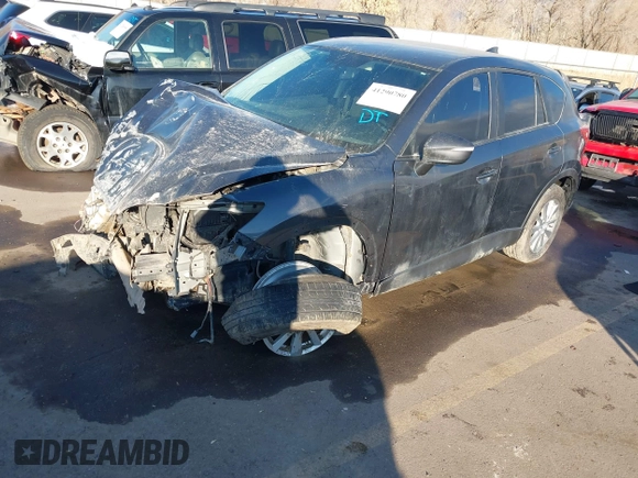 2016 Mazda CX-5 Touring with VIN JM3KE4CY0G0751040, listed as a IAAI auction lot 41290780 with 136,689 mi miles. Bid and sale history available at carsss.com. Image 18.