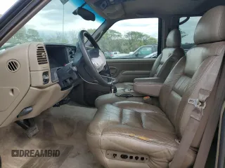 1999 GMC Yukon with VIN 1GKEK13R9XJ787877, listed as a Copart auction lot 72185044 with 191,710 mi miles and Salvage Title. Bid and sale history available at carsss.com. Image 7.