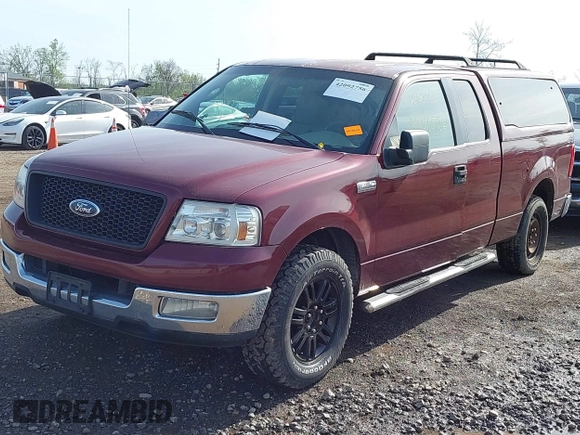 2005 Ford F-150 XLT with VIN 1FTPX12505FB69853, listed as a IAAI auction lot 42092756 with 330,699 mi miles. Bid and sale history available at carsss.com. Image 17.