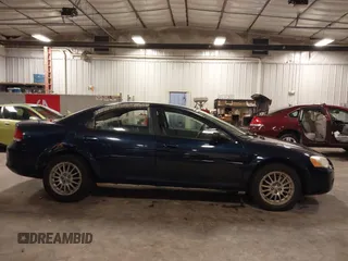 2005 Chrysler Sebring Touring z VIN 1C3EL56R15N659607, wystawiony jako IAAI lot #42102595 z przebiegiem 155 185 mil mil oraz . Historia ofert i sprzedaży dostępna na DreamBid. Obrazek 13.