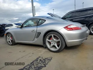 2006 Porsche Cayman S с VIN WP0AB29836U781908, выставлен на аукционе Copart как лот 74551144 с пробегом Не указан миль и Списание • Salvage title. История ставок и продаж доступна на DreamBid. Изображение 2.