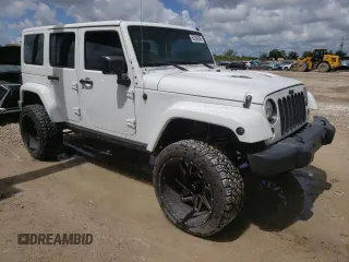 2015 Jeep Wrangler Unlimited Wrangler X with VIN 1C4BJWEG6FL614671, listed as a Copart auction lot 62286095 with 94,928 mi miles and Salvage title. Bid and sale history available at DreamBid. Image 4.