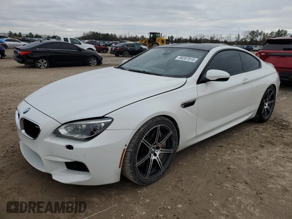 2014 BMW M6 z VIN WBSLX9C51ED160143, wystawiony jako Copart lot #88287015 z przebiegiem 91 717 mil mil oraz Szkoda całkowita • Salvage title. Historia ofert i sprzedaży dostępna na DreamBid. Obrazek 1.