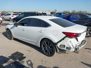 2016 Mazda Mazda6 i Grand Touring with VIN JM1GJ1W54G1456737, listed as a IAAI auction lot 41841001 with 114,870 mi miles. Bid and sale history available at carsss.com. Image 3.
