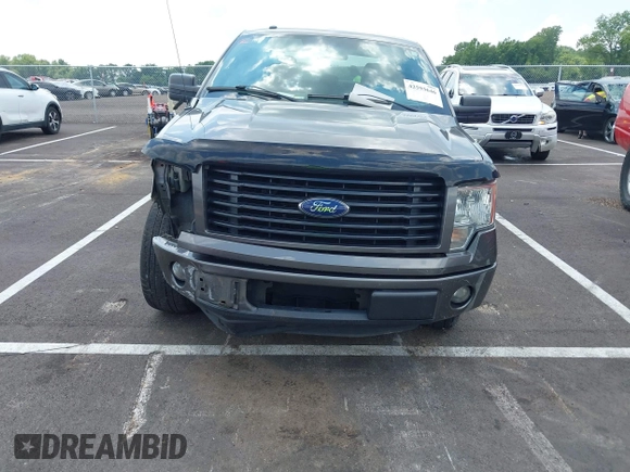 2014 Ford F-150 XL with VIN 1FTEX1CM4EKF42963, listed as a IAAI auction lot 42593646 with 143,409 mi miles and . Bid and sale history available at DreamBid. Image 12.