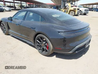 2022 Porsche Taycan GTS z VIN WP0AD2Y12NSA59275, wystawiony jako IAAI lot #42170547 z przebiegiem 43 757 mil mil oraz . Historia ofert i sprzedaży dostępna na DreamBid. Obrazek 3.