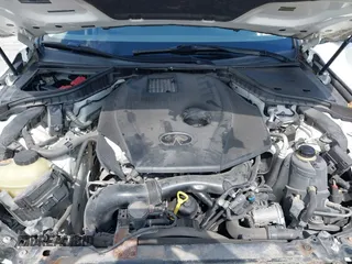 2016 Infiniti Q50 2.0t Premium with VIN JN1CV7AR9GM253439, listed as a IAAI auction lot 39334740 with 90,101 mi miles. Bid and sale history available at carsss.com. Image 10.