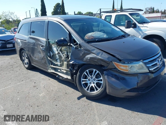 2011 Honda Odyssey EX-L with VIN 5FNRL5H68BB083492, listed as a IAAI auction lot 42087699 with 155,141 mi miles and . Bid and sale history available at carsss.com. Image 1.