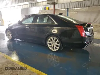 2015 Cadillac CTS Premium AWD z VIN 1G6AZ5S3XF0127669, wystawiony jako Copart lot #56314865 z przebiegiem 211 973 mil mil oraz Czysty tytuł • Clean title. Historia ofert i sprzedaży dostępna na DreamBid. Obrazek 2.