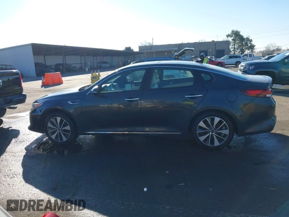 2016 Kia Optima SXL Turbo with VIN 5XXGV4L2XGG051938, listed as a IAAI auction lot 41400484 with 114,722 mi miles. Bid and sale history available at carsss.com. Image 14.