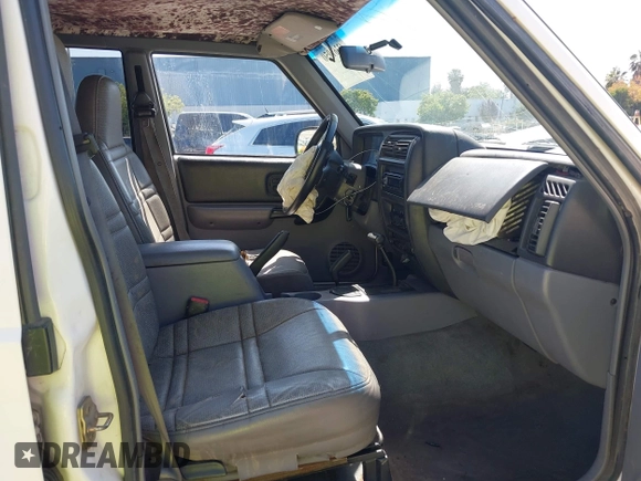 1998 Jeep Cherokee Sport with VIN 1J4FJ68S4WL227094, listed as a IAAI auction lot 42361950 with Not provided miles and . Bid and sale history available at DreamBid. Image 5.