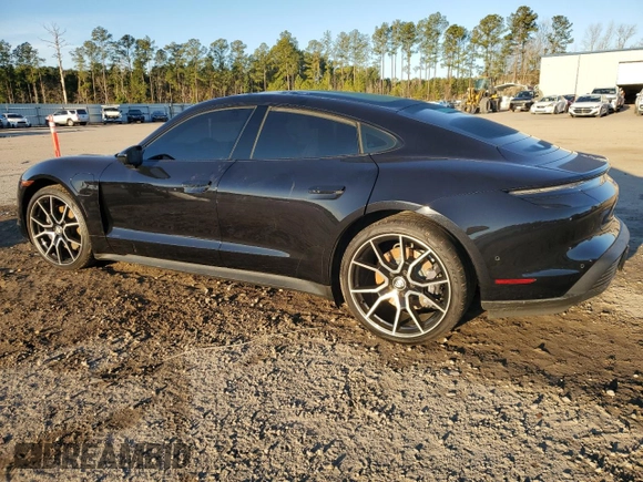 2023 Porsche Taycan with VIN WP0AA2Y10PSA16579, listed as a Copart auction lot 42359635 with 11,981 mi miles and Clean Title. Bid and sale history available at DreamBid. Image 2.