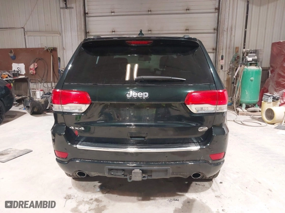 2014 Jeep Grand Cherokee Overland with VIN 1C4RJFCGXEC162109, listed as a IAAI auction lot 41943979 with 147,788 mi miles. Bid and sale history available at carsss.com. Image 17.