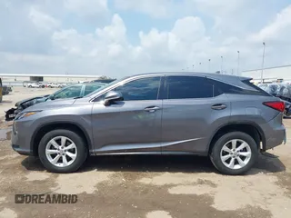 2016 Lexus RX 350 z VIN 2T2ZZMCAXGC031079, wystawiony jako IAAI lot #42120190 z przebiegiem 142 407 mil mil oraz . Historia ofert i sprzedaży dostępna na DreamBid. Obrazek 14.
