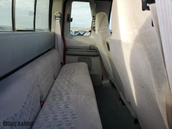 1999 Ford Super Duty F-250 XL with VIN 1FTNX21L8XED59129, listed as a Copart auction lot 88079295 with 135,060 mi miles and Salvage Title. Bid and sale history available at carsss.com. Image 11.
