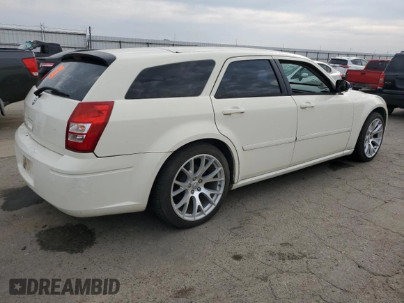 2005 Dodge Magnum z VIN 2D4FV48TX5H692873, wystawiony jako Copart lot #87230504 z przebiegiem 166 497 mil mil oraz Szkody całkowita. Historia ofert i sprzedaży dostępna na DreamBid. Obrazek 3.