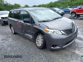 2014 Toyota Sienna LE with VIN 5TDJK3DC8ES090281, listed as a IAAI auction lot 42701551 with 137,868 mi miles and . Bid and sale history available at DreamBid. Image 1.
