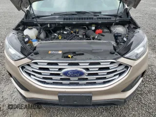 2020 Ford Edge SE с VIN 2FMPK3G9XLBA36467, выставлен на аукционе Copart как лот 51121035 с пробегом 86 437 миль миль и Списание • Salvage title. История ставок и продаж доступна на DreamBid. Изображение 12.