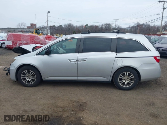 2013 Honda Odyssey EX-L with VIN 5FNRL5H65DB050789, listed as a IAAI auction lot 41911537 with 160,348 mi miles and . Bid and sale history available at carsss.com. Image 14.