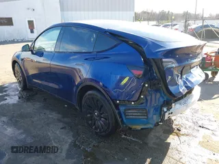2023 Tesla Model Y Long Range with VIN 7SAYGDEE4PA042757, listed as a IAAI auction lot 41652541 with 48,569 mi miles. Bid and sale history available at carsss.com. Image 3.