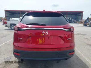 2016 Mazda CX-9 Touring with VIN JM3TCACY4G0112961, listed as a IAAI auction lot 42094718 with 114,679 mi miles and . Bid and sale history available at DreamBid. Image 16.