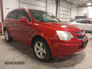 2014 Chevrolet Captiva Sport LT z VIN 3GNAL3EK2ES609279, wystawiony jako IAAI lot #42135344 z przebiegiem 46 330 mil mil oraz . Historia ofert i sprzedaży dostępna na DreamBid. Obrazek 1.