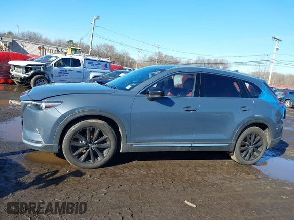 2021 Mazda CX-9 Grand Touring with VIN JM3TCBDY5M0506632, listed as a IAAI auction lot 41589264 with 50,026 mi miles and . Bid and sale history available at carsss.com. Image 14.
