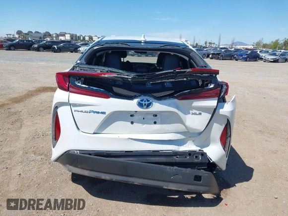 2021 Toyota Prius LE with VIN JTDKAMFP2M3184900, listed as a IAAI auction lot 42014569 with 81,563 mi miles and . Bid and sale history available at DreamBid. Image 16.