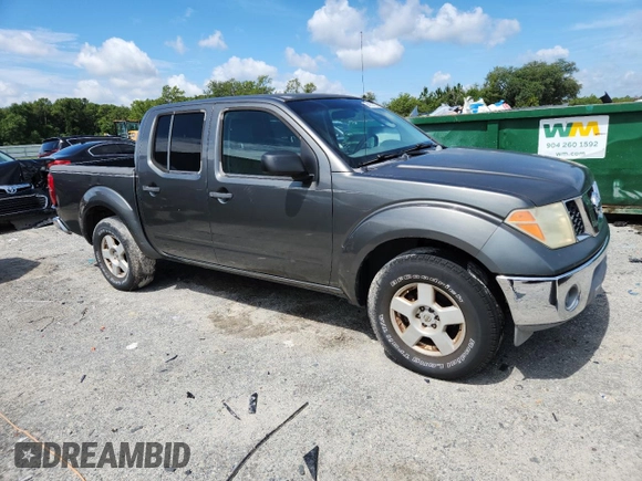 2005 Nissan Frontier LE with VIN 1N6AD07UX5C450937, listed as a Copart auction lot 64102725 with 210,701 mi miles and Clean title. Bid and sale history available at DreamBid. Image 4.