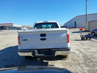 2014 Ford F-150 XL with VIN 1FTFX1EF0EKF01068, listed as a IAAI auction lot 41641910 with 212,728 mi miles. Bid and sale history available at carsss.com. Image 16.