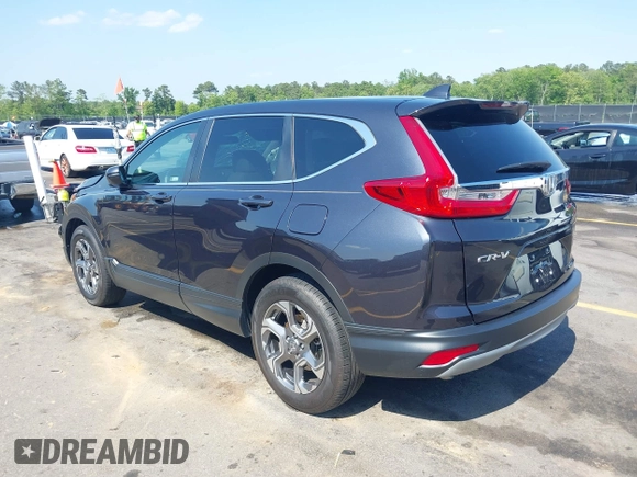 2019 Honda CR-V EX with VIN 2HKRW1H52KH513252, listed as a IAAI auction lot 42074091 with 31,764 mi miles and . Bid and sale history available at DreamBid. Image 3.