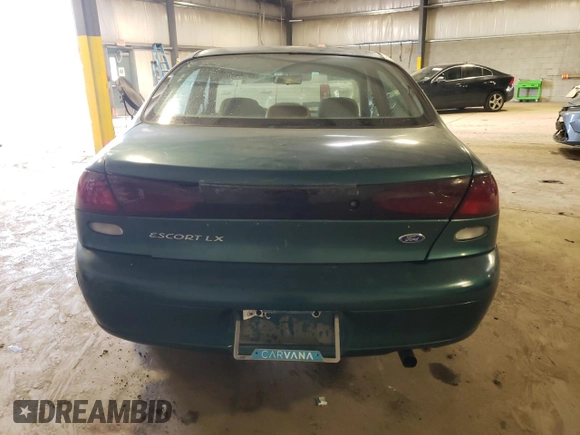 1997 Ford Escort LX with VIN 1FALP13P8VW210282, listed as a Copart auction lot 60137534 with 78,943 mi miles and Salvage Title. Bid and sale history available at DreamBid. Image 6.