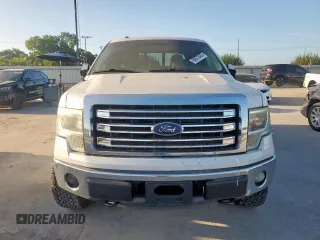 2014 Ford F-150 XL with VIN 1FTFW1EF0EKF18679, listed as a Copart auction lot 60872435 with 128,203 mi miles and Salvage title. Bid and sale history available at DreamBid. Image 5.