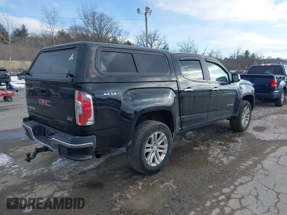 2015 GMC Canyon 4WD SLT with VIN 1GTG6CE39F1238269, listed as a IAAI auction lot 41327897 with 155,663 mi miles. Bid and sale history available at carsss.com. Image 4.