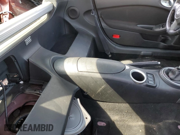 2013 Nissan 370Z Touring z VIN JN1AZ4EHXDM383169, wystawiony jako Copart lot #59787045 z przebiegiem 76 601 mil mil oraz Szkoda całkowita • Salvage title. Historia ofert i sprzedaży dostępna na DreamBid. Obrazek 10.