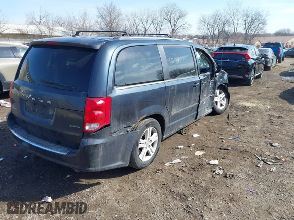 2013 Dodge Grand Caravan Crew with VIN 2C4RDGDG8DR795483, listed as a IAAI auction lot 41781570 with 188,098 mi miles and . Bid and sale history available at DreamBid. Image 4.