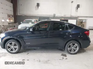 2016 BMW X6 xDrive35i z VIN 5UXKU2C50G0N83095, wystawiony jako IAAI lot #42162171 z przebiegiem 125 324 mil mil oraz . Historia ofert i sprzedaży dostępna na DreamBid. Obrazek 14.