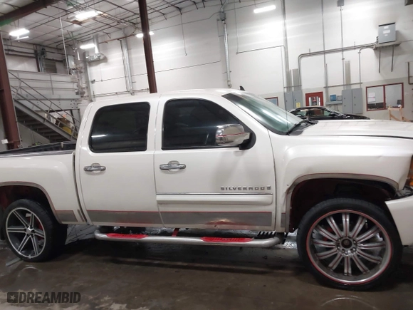 2009 Chevrolet Silverado 1500 LTZ with VIN 3GCEK33M39G177554, listed as a IAAI auction lot 41282566 with 142,356 mi miles. Bid and sale history available at carsss.com. Image 14.