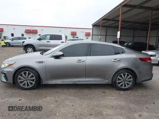 2019 Kia Optima EX with VIN 5XXGU4L1XKG324394, listed as a IAAI auction lot 41607905 with 69,980 mi miles. Bid and sale history available at carsss.com. Image 14.