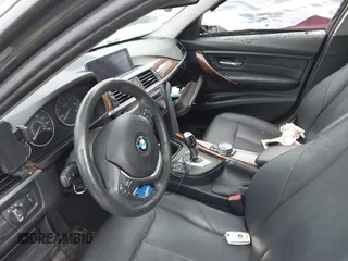 2014 BMW 3 Series 328d xDrive with VIN WBA3D5C55EKX98381, listed as a IAAI auction lot 41590673 with Not Provided miles. Bid and sale history available at carsss.com. Image 5.