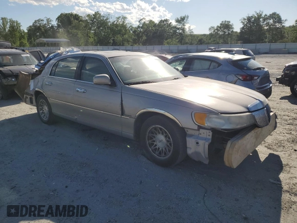 1999 Lincoln Town Car Signature z VIN 1LNHM82W7XY626305, wystawiony jako Copart lot #58009475 z przebiegiem Nie podano mil oraz Szkoda całkowita • Salvage title. Historia ofert i sprzedaży dostępna na DreamBid. Obrazek 4.