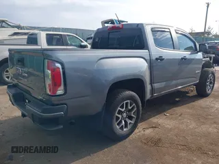 2022 GMC Canyon 4WD AT4 z VIN 1GTG6FEN2N1101756, wystawiony jako IAAI lot #42107148 z przebiegiem 37 900 mil mil oraz . Historia ofert i sprzedaży dostępna na DreamBid. Obrazek 4.