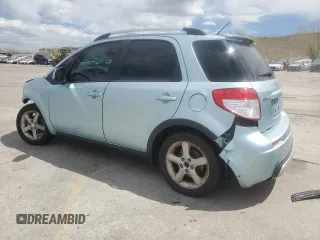 2009 Suzuki SX4 Touring AWD z VIN JS2YB417396203092, wystawiony jako Copart lot #53965685 z przebiegiem 153 701 mil mil oraz Szkoda całkowita • Salvage title. Historia ofert i sprzedaży dostępna na DreamBid. Obrazek 2.