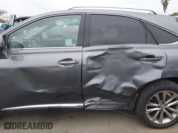 2013 Lexus RX 450h with VIN JTJBC1BAXD2063528, listed as a IAAI auction lot 41745770 with 140,605 mi miles and . Bid and sale history available at DreamBid. Image 6.