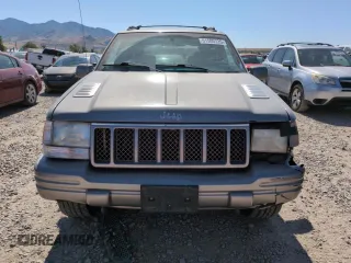 1998 Jeep Grand Cherokee Limited z VIN 1J4GZ88Z8WC306919, wystawiony jako Copart lot #61505725 z przebiegiem 195 329 mil mil oraz Czysty tytuł • Clean title. Historia ofert i sprzedaży dostępna na DreamBid. Obrazek 5.