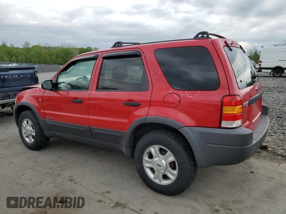 2002 Ford Escape XLT Choice with VIN 1FMCU04132KB16848, listed as a Copart auction lot 55266595 with 205,451 mi miles and Salvage title. Bid and sale history available at DreamBid. Image 2.