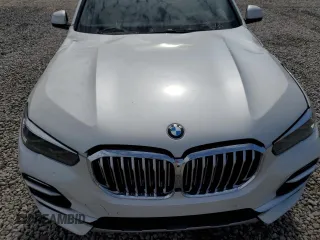 2019 BMW X5 xDrive40i with VIN 5UXCR6C5XKLK80703, listed as a Copart auction lot 63473495 with 57,260 mi miles and Salvage title. Bid and sale history available at DreamBid. Image 12.