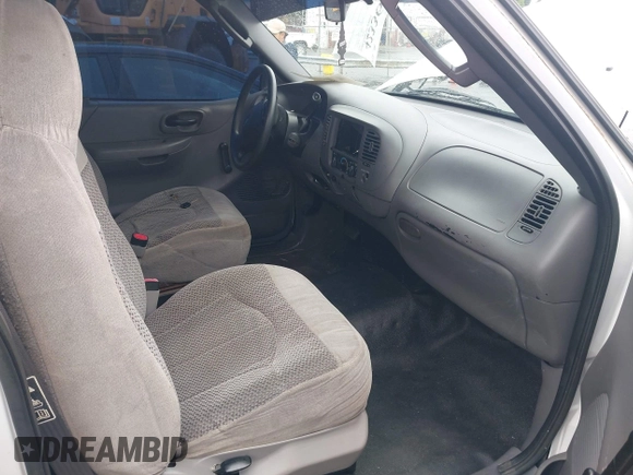 2002 Ford F-150 XL with VIN 1FTRF17242NB86232, listed as a IAAI auction lot 42336859 with 119,321 mi miles and . Bid and sale history available at DreamBid. Image 5.
