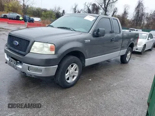 2004 Ford F-150 STX with VIN 1FTRX14W44NA05055, listed as a IAAI auction lot 41960979 with 184,479 mi miles and . Bid and sale history available at DreamBid. Image 2.